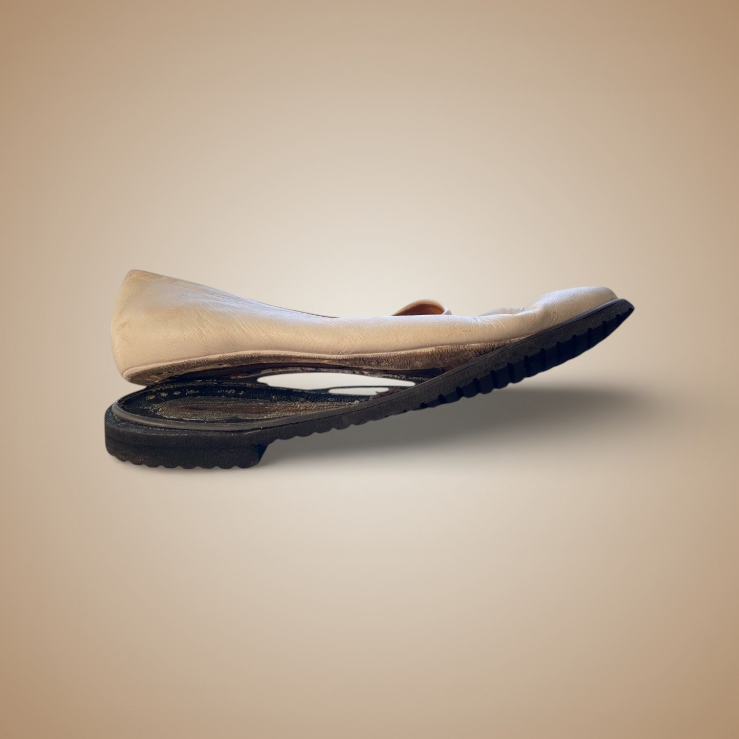 Bally white loafer before restoration — yellowed and worn white leather